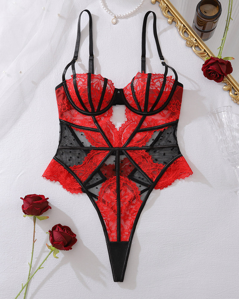 Red and black lace corset bodysuit on flat lay, plunge cups, mesh panels, strappy back