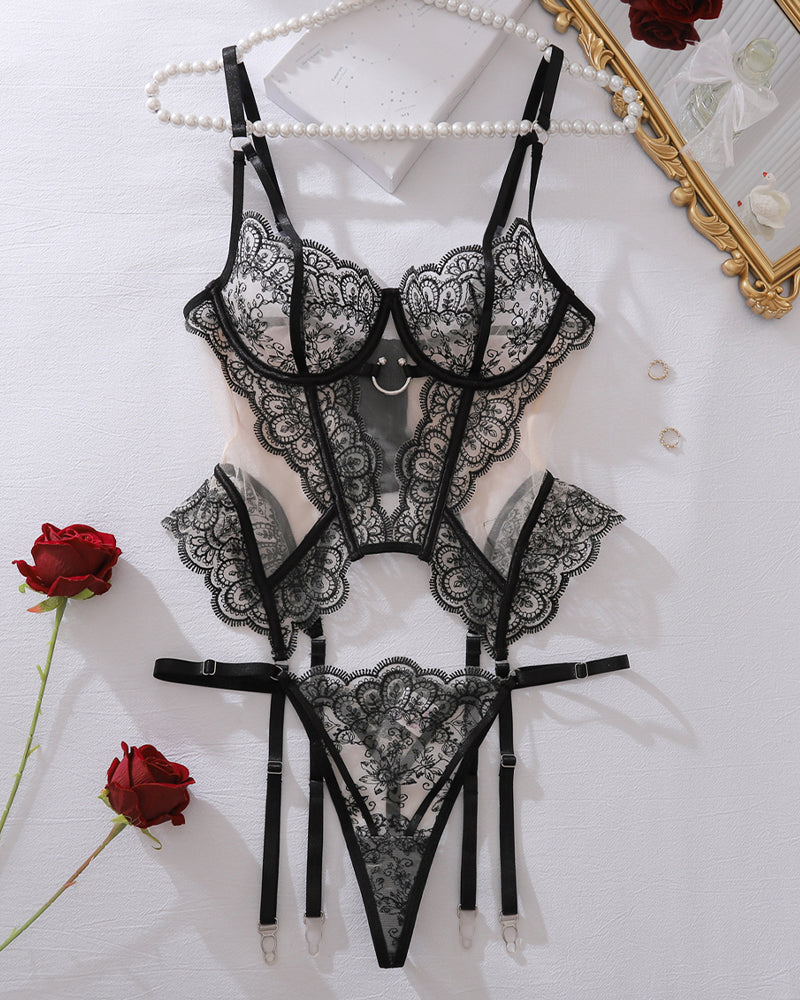 Black floral-embroidered sheer mesh corset set with lace cups and garter straps