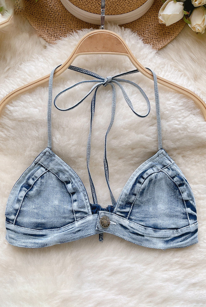 Light-wash denim halter bra top with button front and tie-back straps