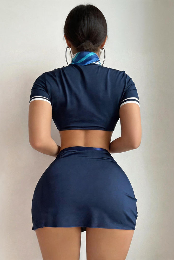 Navy lingerie set with blue neck scarf; back view crop top and mini skirt