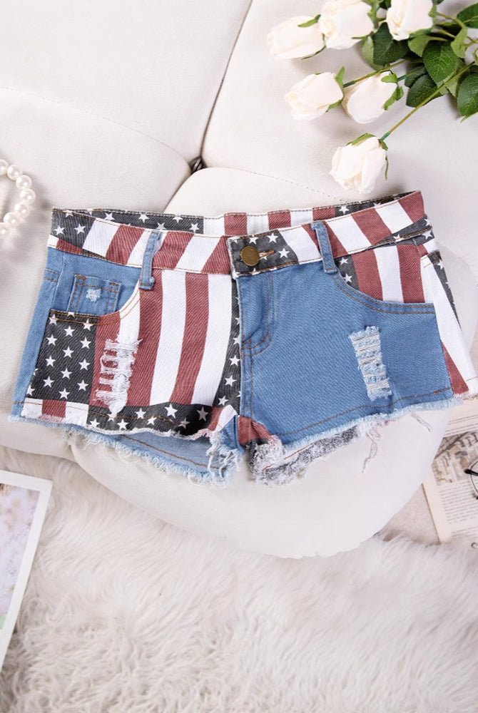 High-waisted distressed denim shorts, American flag patchwork with front pocket detail