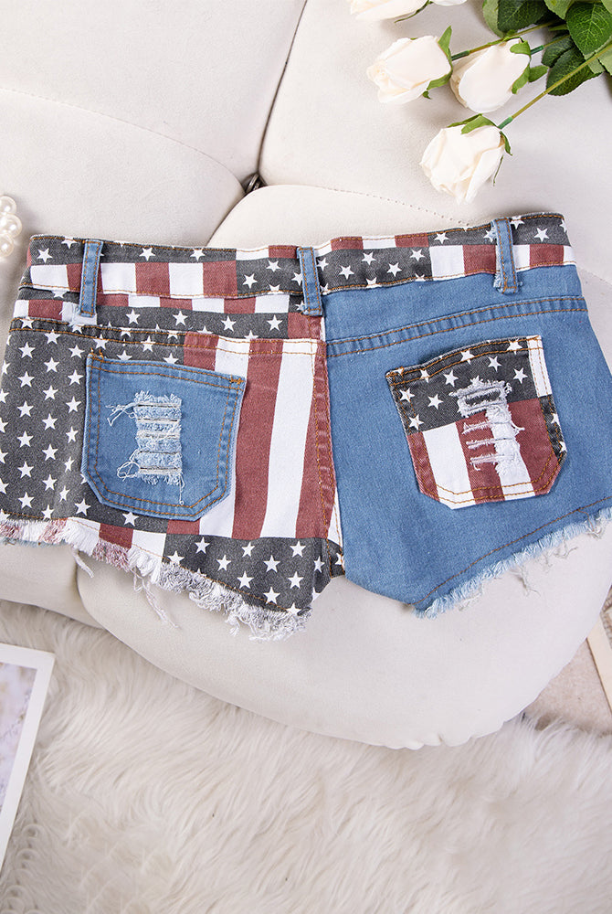 High-waisted distressed denim shorts with American flag patch pockets, frayed hem