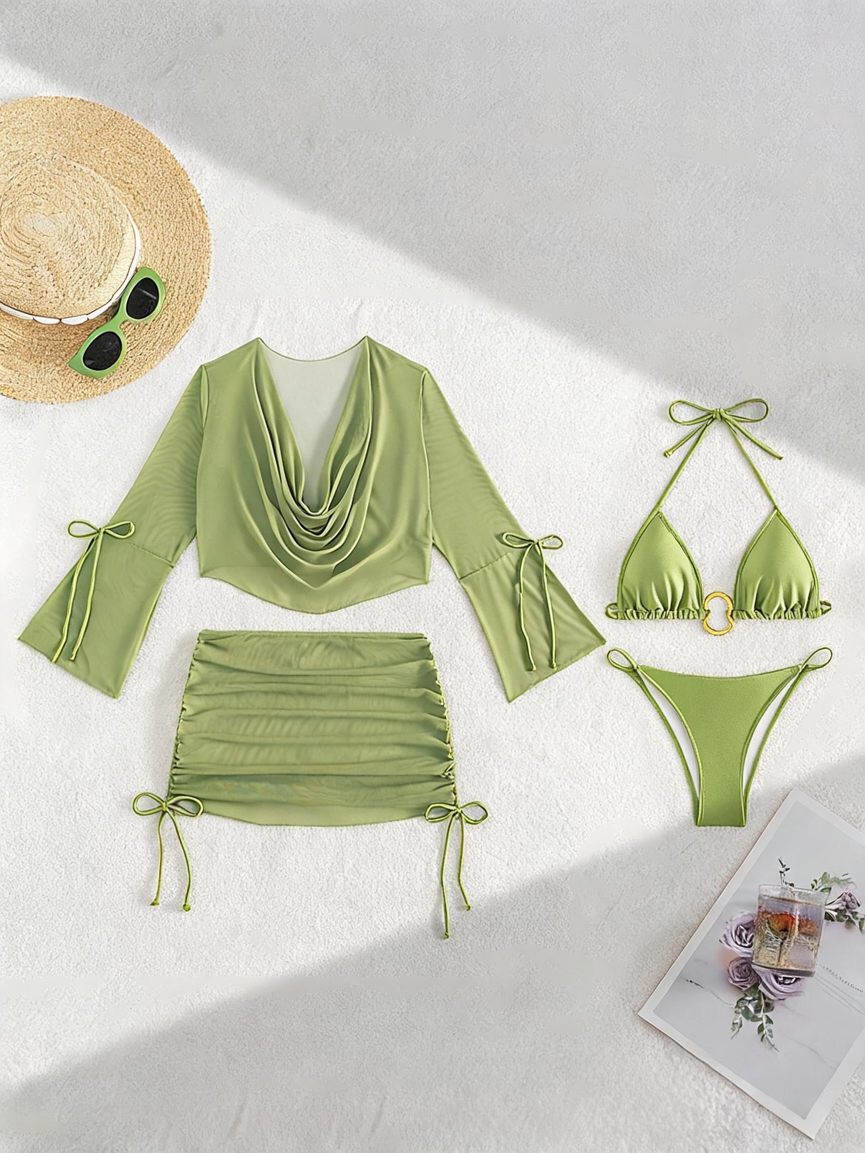 Green bikini set pieces: long-sleeve cover-up top, ruched mini skirt, triangle bikini