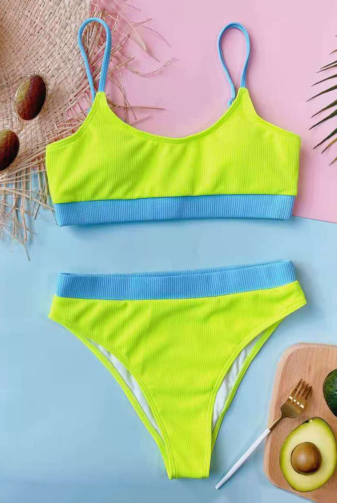 Neon green ribbed crop bikini set with blue trim, matching high-waist bikini bottoms