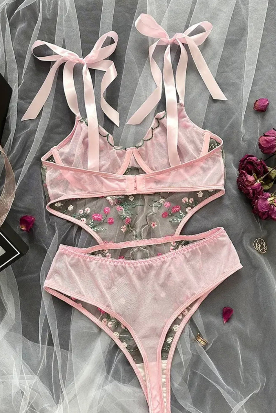 Pink floral embroidered sheer bodysuit with bow straps and high-cut panty