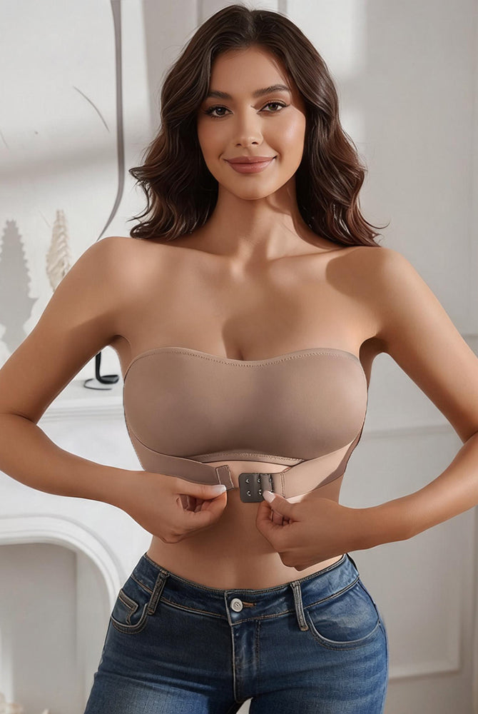Skin-tone strapless bandeau top with front buckle closure