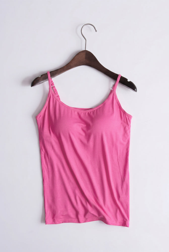 Pink built-in bra spaghetti strap tank top on wooden hanger