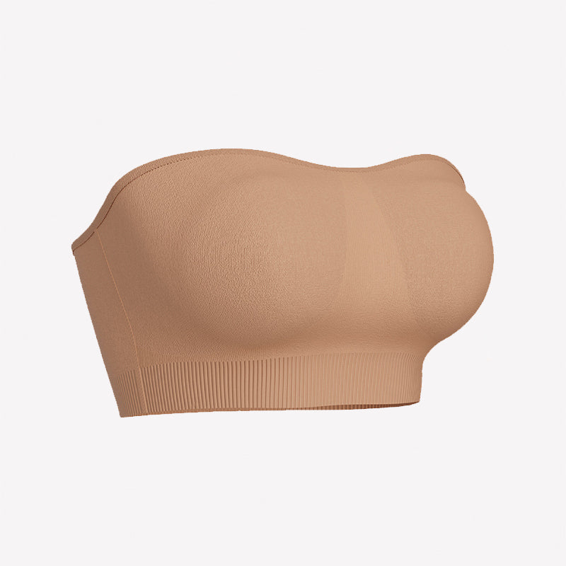 Skin-toned strapless bandeau bra with padded cups and ribbed bottom band