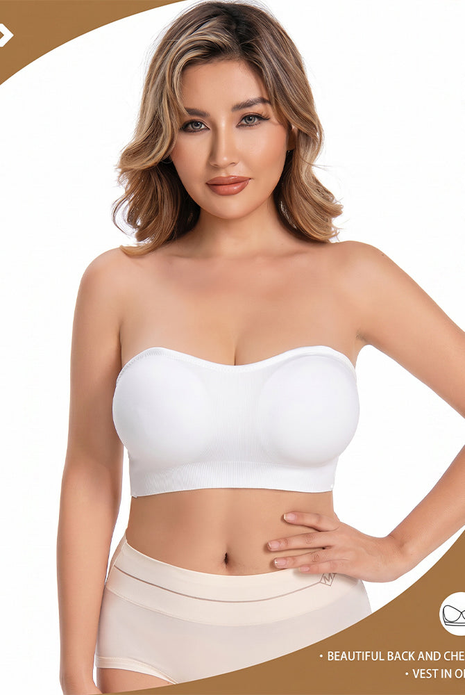 White strapless bandeau bra with removable pads worn by model, seamless cups