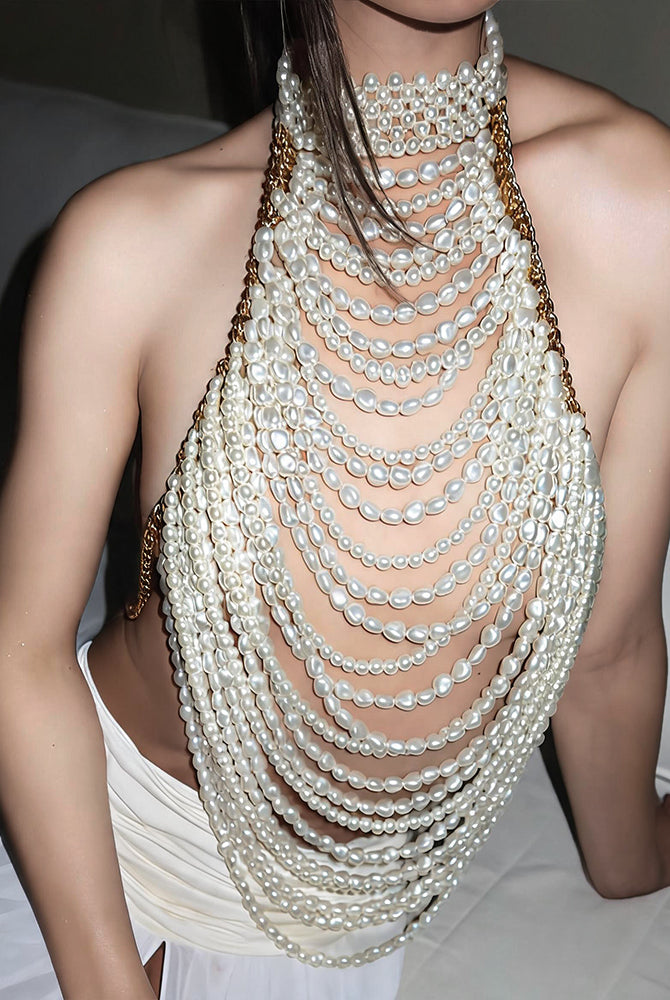 White pearl halter fringe crop top with layered bead strands and open neckline