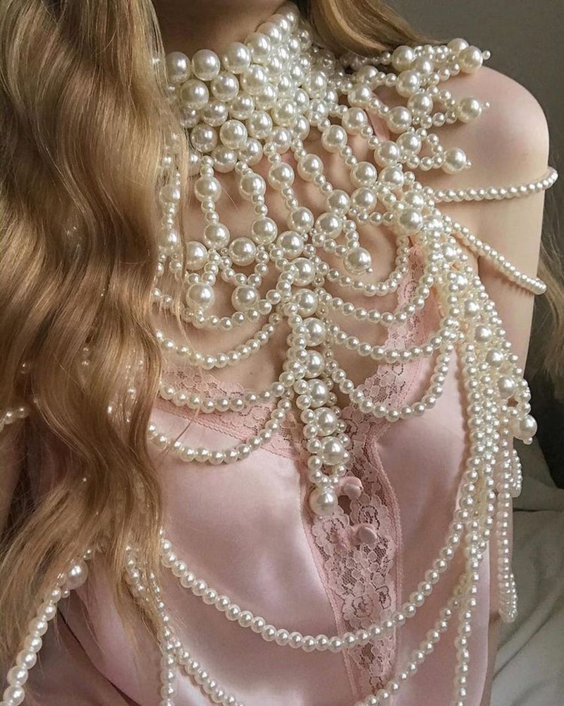 Pearl fringe halter top with dense cascading pearl strands across the chest and straps