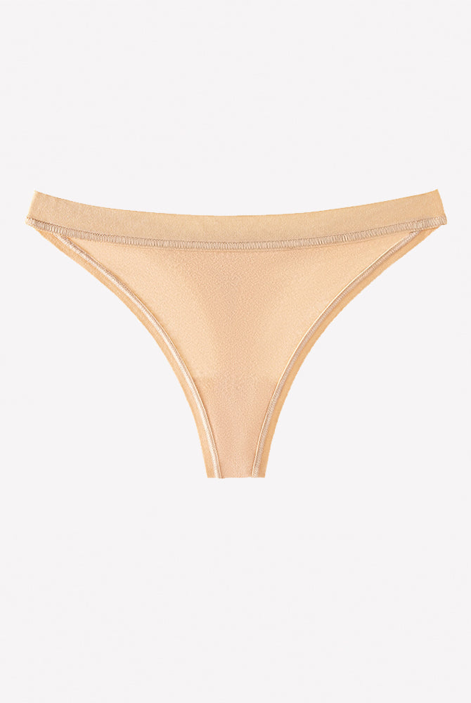 Low-rise seamless thong panties, apricot, cotton knit, minimal coverage