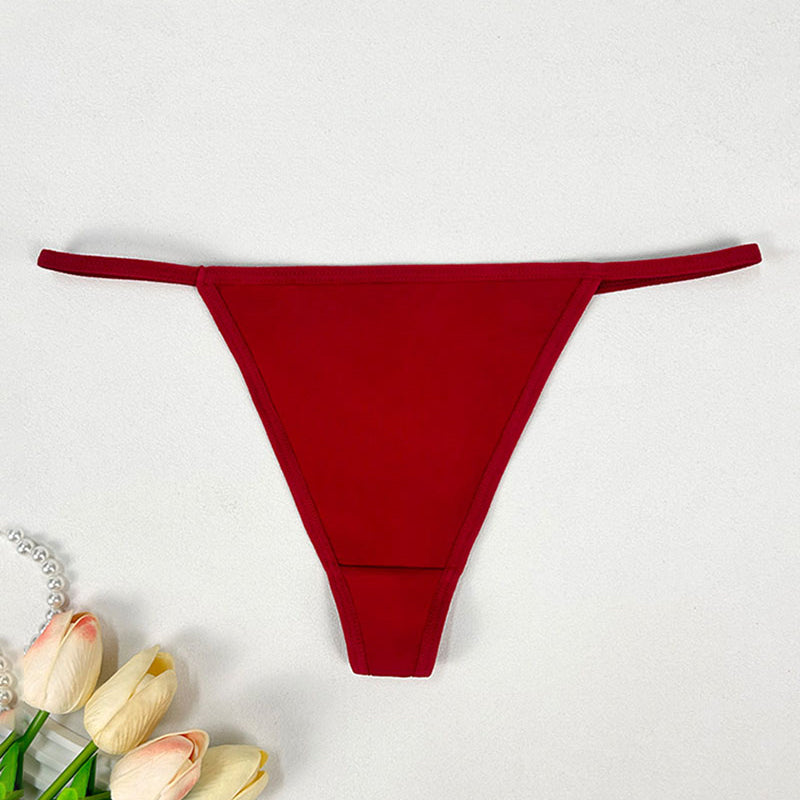 Low-rise thong panties in red with seamless soft stretch fabric and low-rise fit.