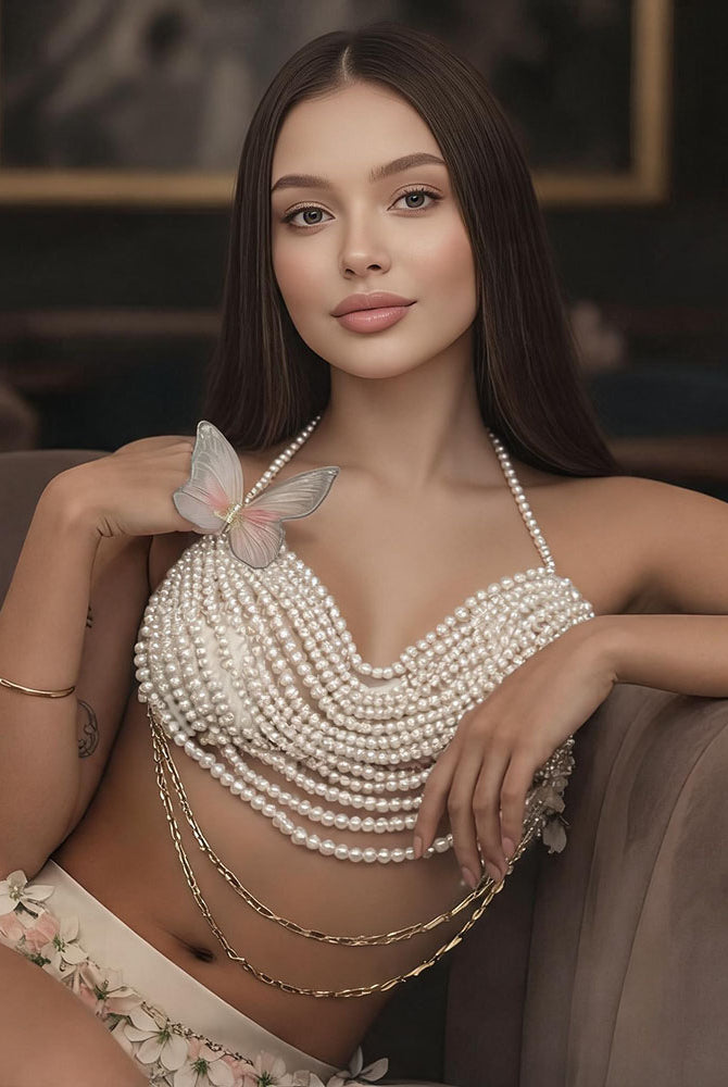 White pearl body jewelry halter top with butterfly detail and draped pearl rows
