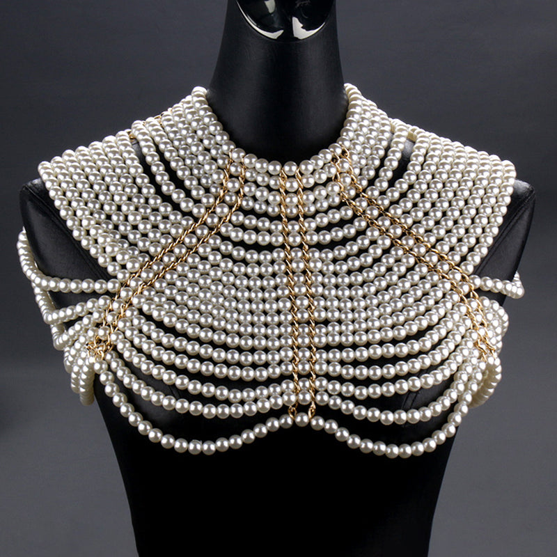 Pearl chain shoulder embellishment with gold clasp and layered pearl strings