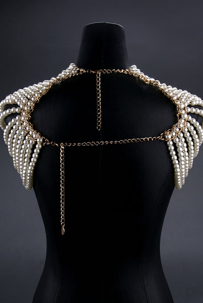 Pearl chain shoulder embellishment with long dangling charms; layered pearl strings