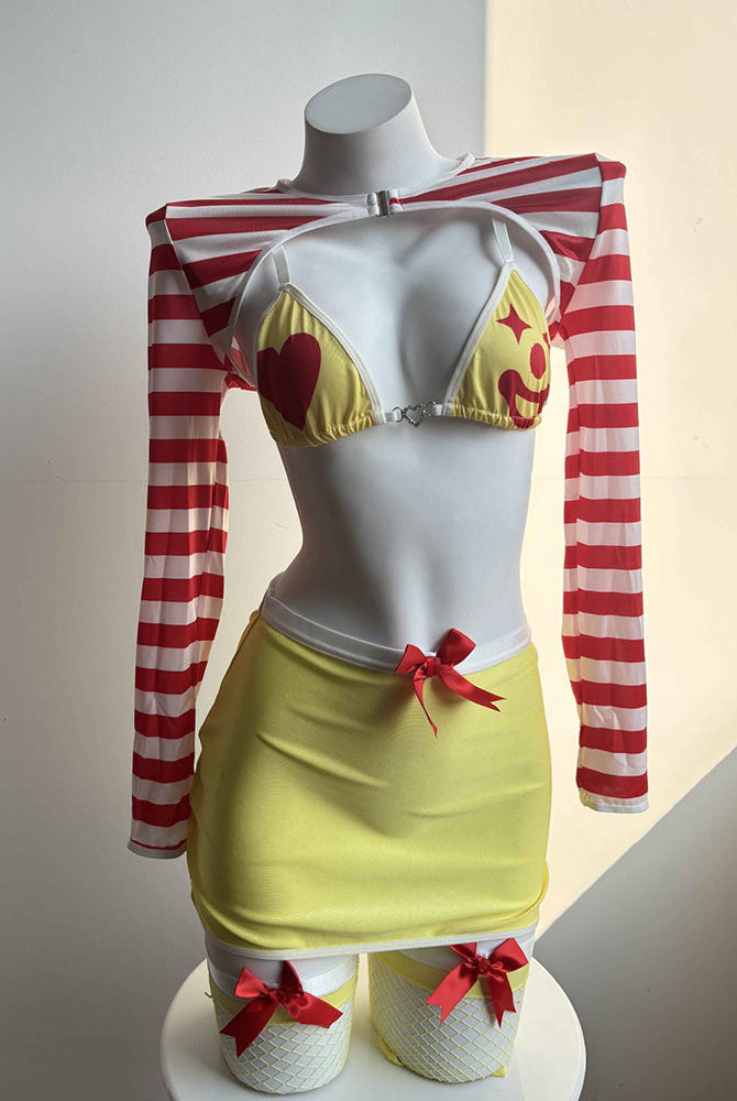 Mannequin front: yellow mini skirt lingerie set with striped sleeves and fishnet stockings.