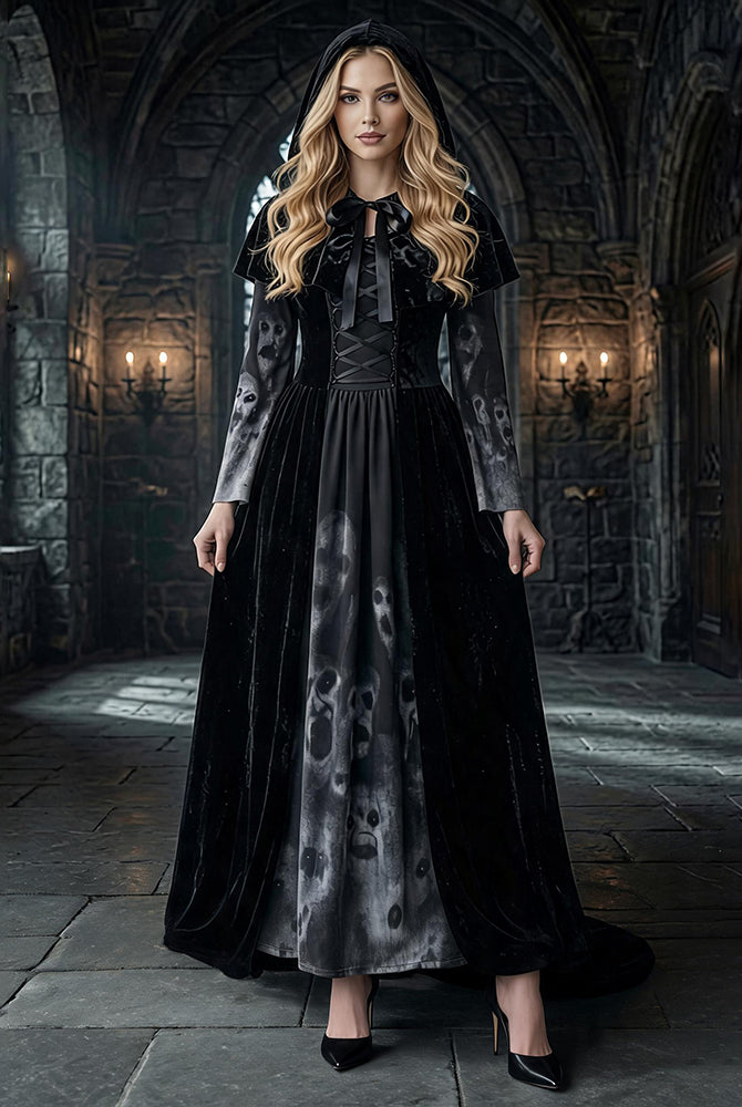 Black maxi dress with long sleeves, tie-neck bodice, and skull-print cape and skirt panels
