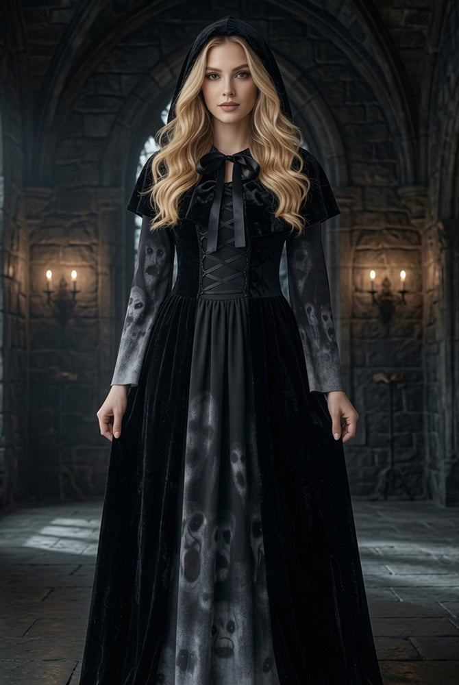 Black maxi dress with long sleeves, tie-neck bodice, corset-laced waist, and skull-print cape