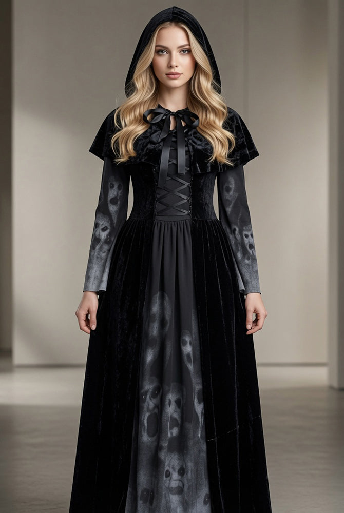 Black maxi dress with hooded cape, bow tie neckline, long sleeves, and skull-print skirt panels