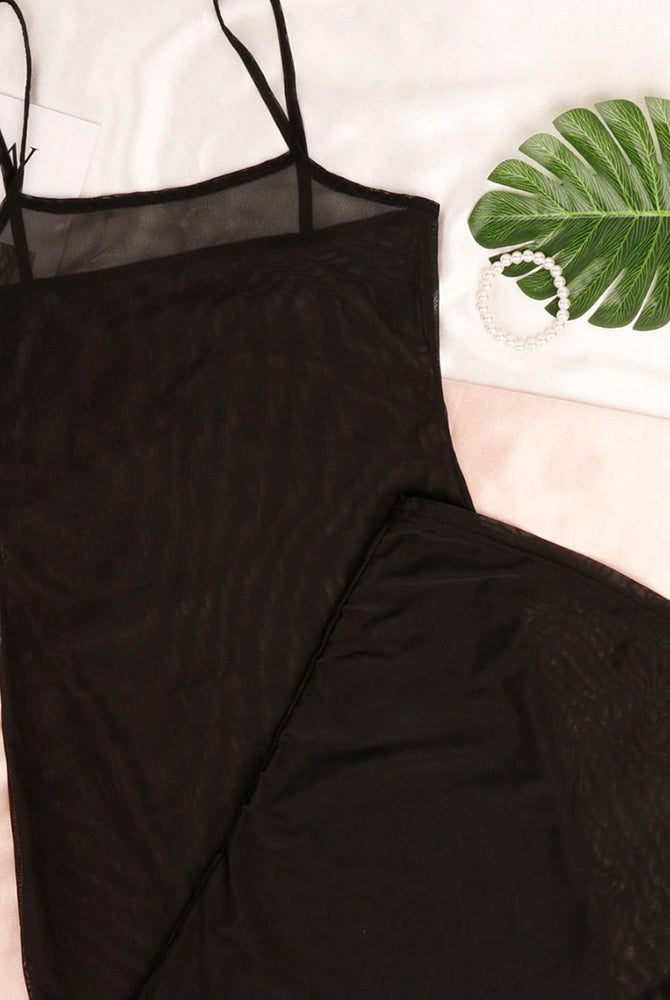 Black sheer mesh lingerie dress close-up, thin straps and long bodycon shape