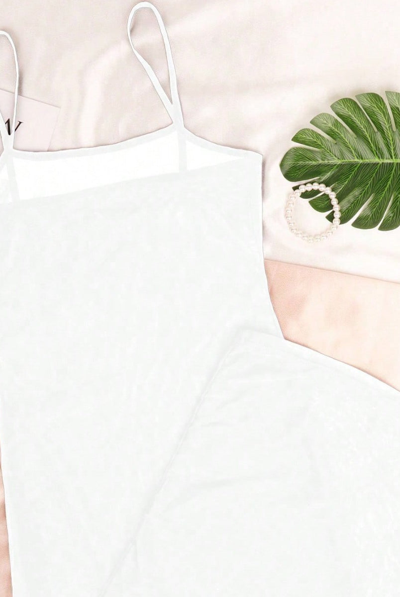 White sheer mesh slip dress with thin spaghetti straps and long bodycon silhouette