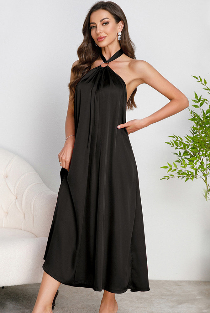 Black satin halter slip dress with O-ring detail and open back, mid-calf length