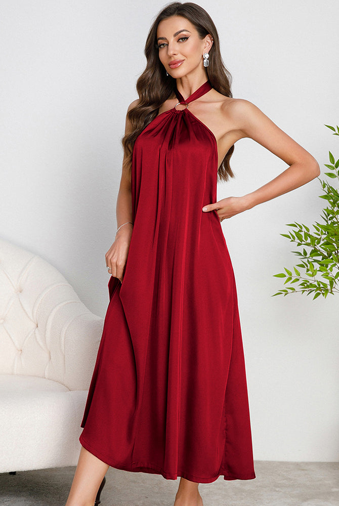 Red satin halter slip dress with O-ring neckline and open back, mid-calf length