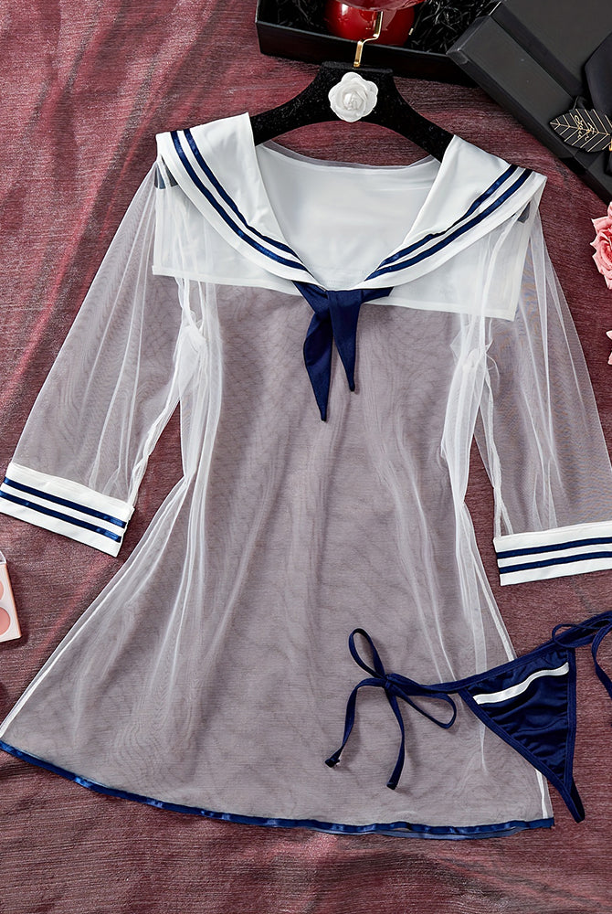 Sheer sailor mesh dress with navy trim, white collar and bow, flared hem