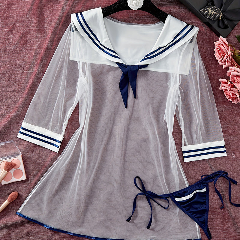 Sheer sailor mesh dress with navy trim, white collar and bow, flared hem