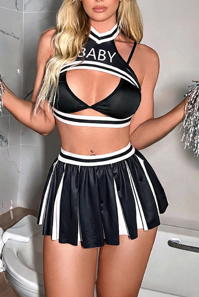 Black cheerleader lingerie set: cut-out triangle bra and pleated skirt with white trim.