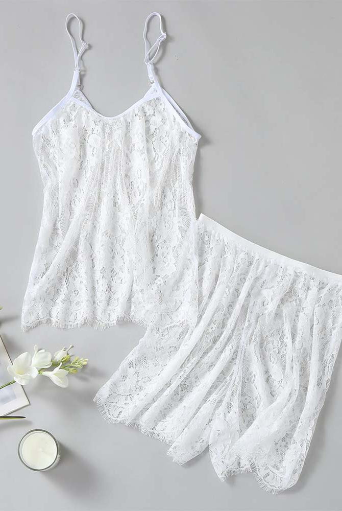 White floral lace camisole and shorts set laid flat, camisole top with lace trim