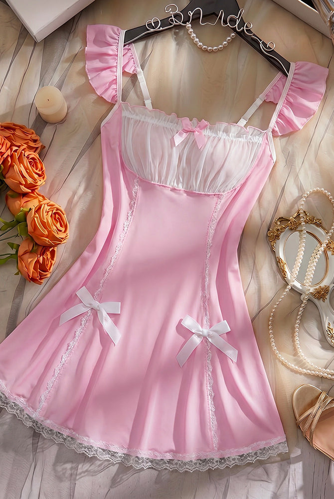Pink satin babydoll mini dress with ruffled sleeves, lace trim, and bow accents