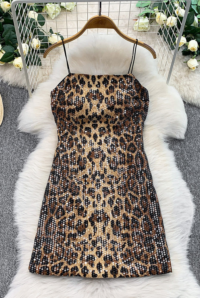 Leopard sequin mini dress on hanger, spaghetti straps, fitted silhouette