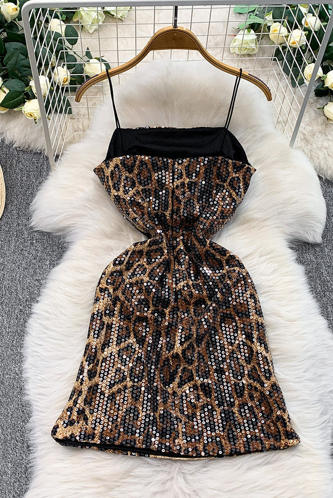 Leopard sequin mini dress on hanger, V-back with spaghetti straps