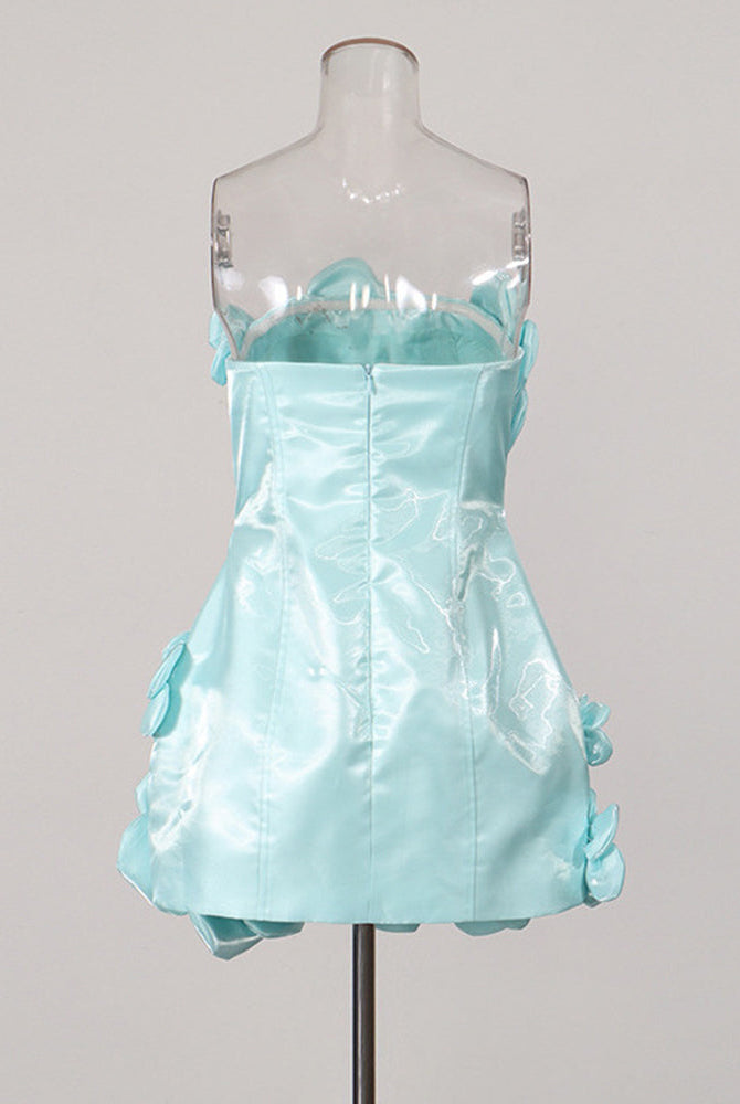 Sky blue strapless corset mini dress on a mannequin with side 3D floral accents.