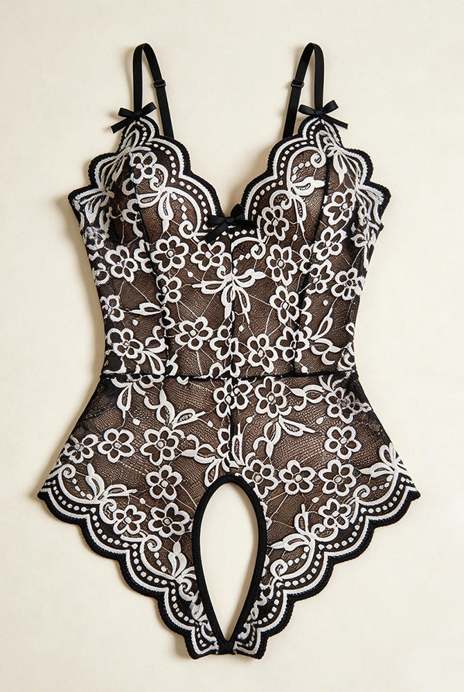 Black and white floral lace crotchless teddy with v-neck and bow-strap ties
