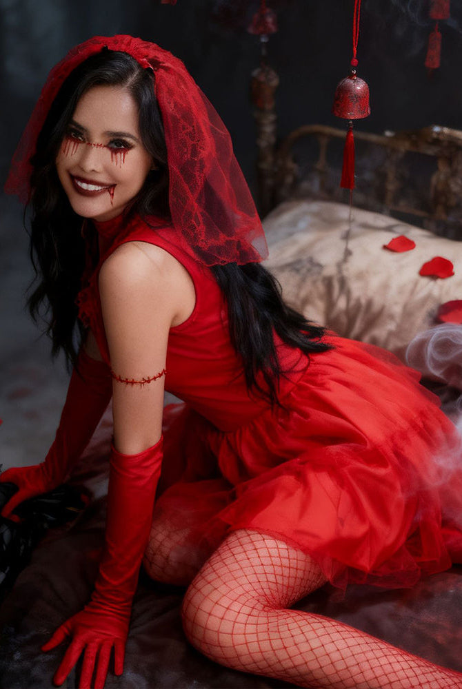 Red vampire bridal costume mini dress with tulle skirt, veil, fishnet stockings and gloves