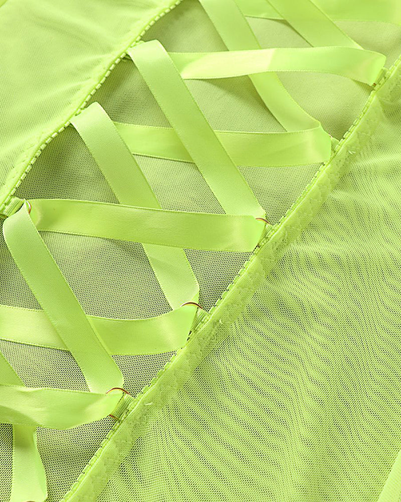 Neon green sheer mesh fabric texture with stitched lattice trim