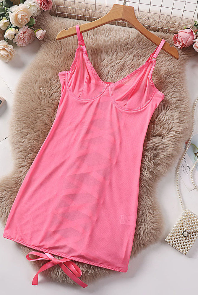 Pink sheer mesh underwire mini dress laid flat with tie hem and spaghetti straps