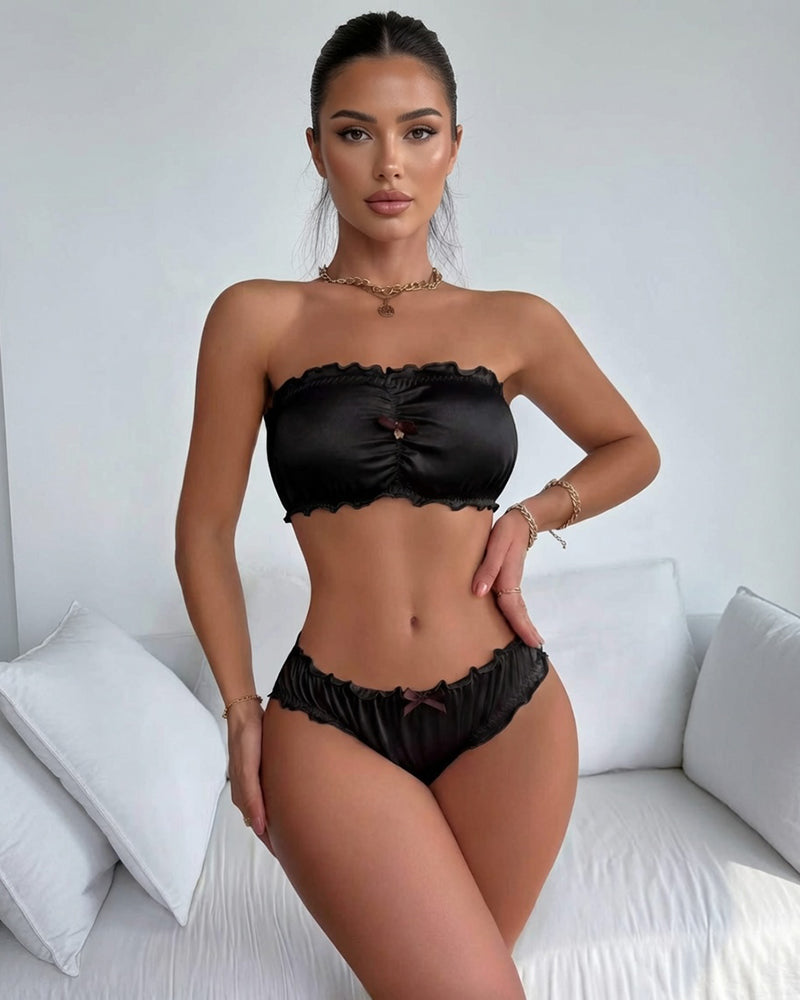 Black satin strapless bandeau bra with ruched center and ruffle panty set