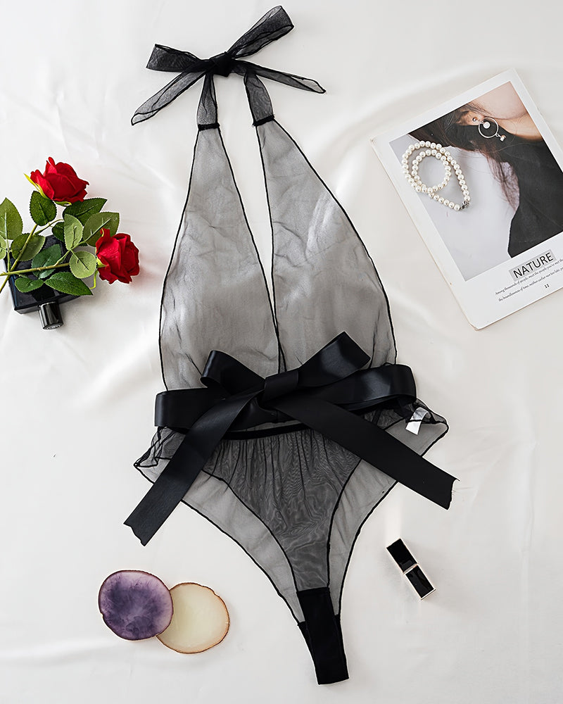 Black sheer mesh halter bodysuit with deep V and satin bow, flat lay