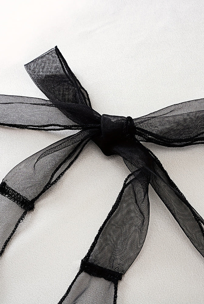 Black satin bow ribbon detail on sheer mesh halter bodysuit