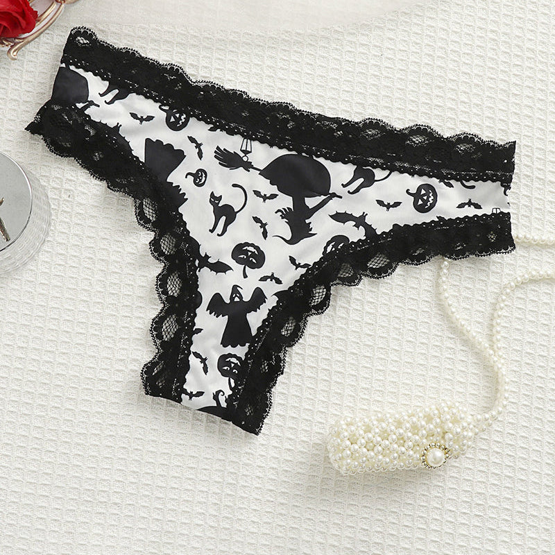 White lace-trim thong panty with black Halloween character print