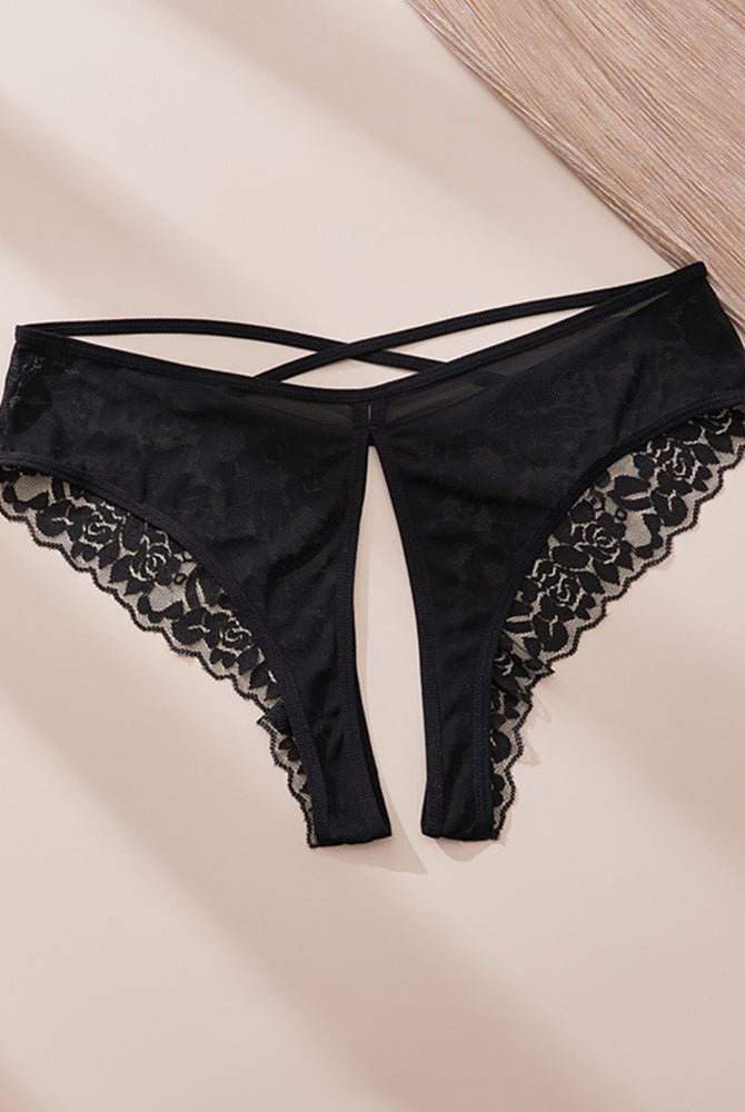 Black lace crotchless panties with criss-cross front straps and scalloped edges
