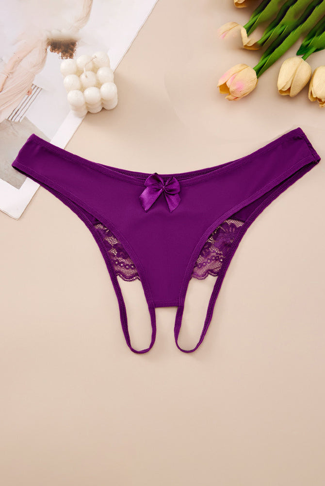 Plus size purple crotchless lace thong with lace-trim waistband and center bow