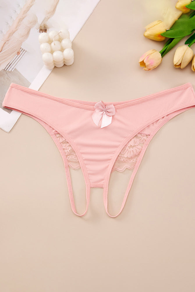 Plus size pink crotchless lace thong with lace-trim waistband and center bow