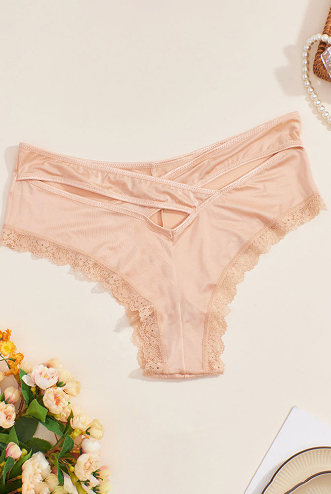 Nude mid-rise criss-cross bikini panties with lace trim