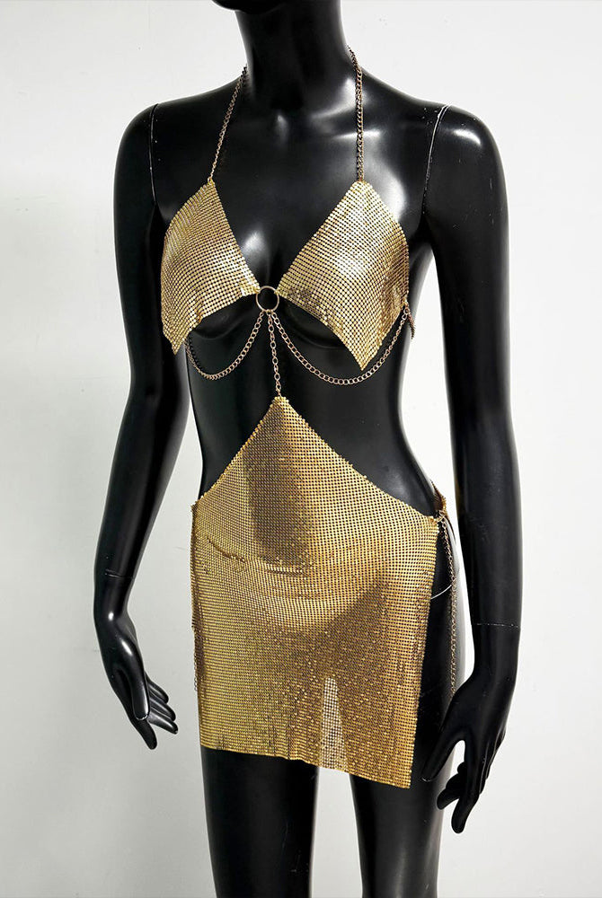 Gold metallic chain bra top and mini skirt set on mannequin, ring front detail