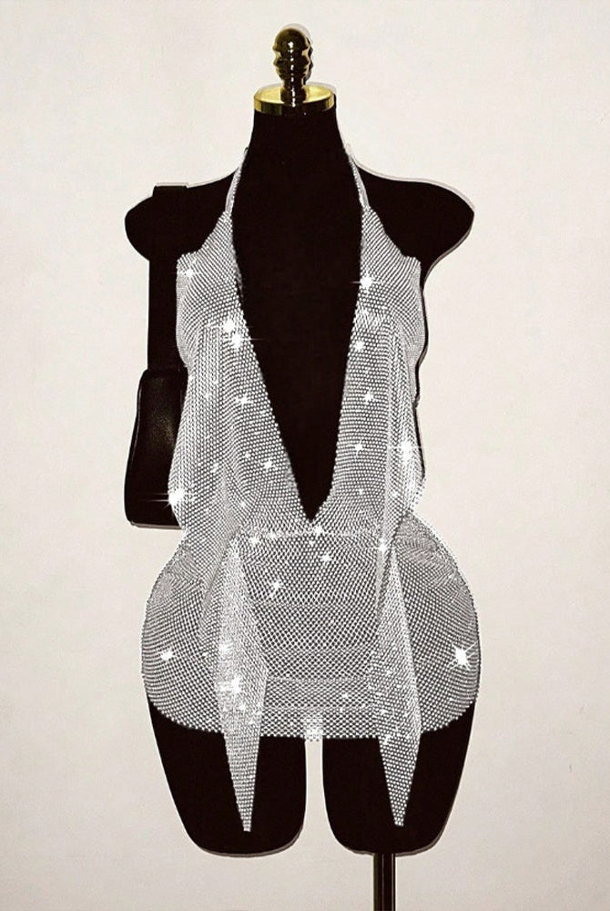 Silver rhinestone fishnet halter mini dress on mannequin with open-back design